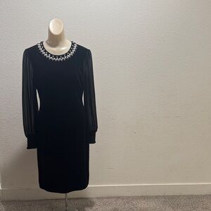 Elegant Black Dress with Pearl Detailing